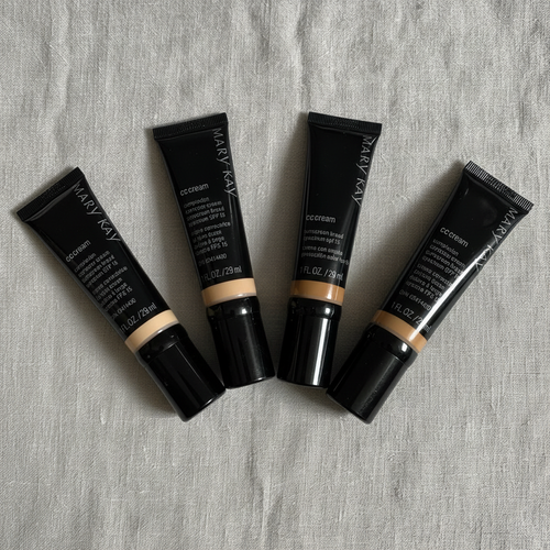 Mary Kay CC Cream five shades fanned out on linen showing full shade range – lifestyle photo, More4less Outlet