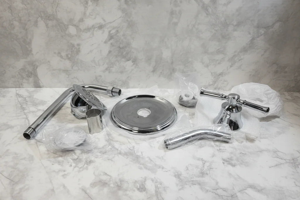 Studio setting displaying chrome shower head and handle trim kit on neutral background