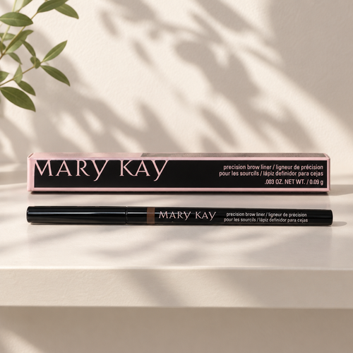 Mary Kay Precision Brow Liner pencil and retail box on a pale shelf in morning light