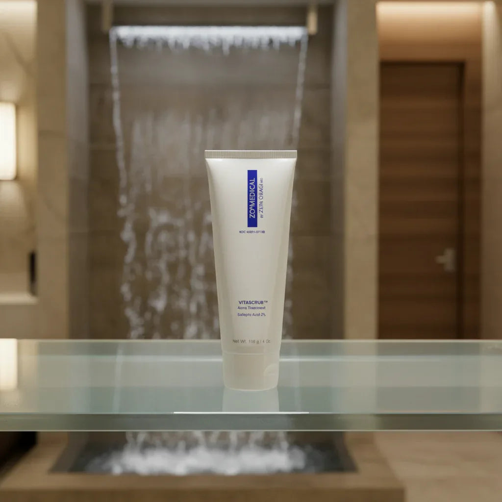 ZO Medical Vitascrub on frosted glass shelf in luxury spa restroom with waterfall background