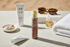 Flat lay beach-ready skincare routine featuring SOL by Jergens body bronzer pump bottle
