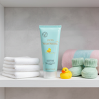 JAFRA Tender Moments Baby Massage Cream on nursery shelf with washcloths and rubber duck – More4less Outlet
