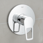 Grohe BauLoop polished chrome shower valve trim close-up showing loop lever handle detail and mirror chrome finish on grey tile