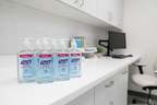 Purell Advanced 12oz pump bottles organized at medical workstation hospital hygiene — More4less Outlet