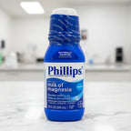Crisp high fidelity documentation of digestive health medicine blue bottle for ingredient transparency standards on marble