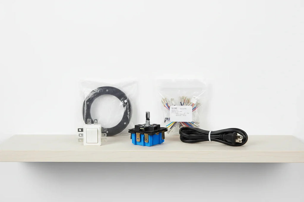 Clean minimalist shelf display of genuine appliance replacement components and electrical switches