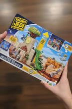 In-hand close-up of Star Wars Young Jedi Adventures Tenoo Jedi Temple box character art and details