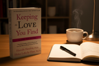 Keeping the Love You Find by Harville Hendrix paperback on desk with journal pen and coffee self-improvement setup – More4less Outlet