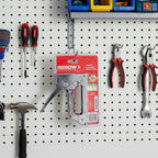Arrow JT21 Stapler displayed on organized pegboard garage wall with home maintenance tools
