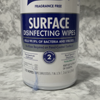 Macro close-up of Purell Healthcare Surface Disinfecting Wipes label highlighting Fragrance Free 110 Wipes and Two Minute Disinfection badge