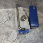 Grohe wall mount shower arm with escutcheon brushed nickel flat lay on white marble with installation guide and original Grohe retail box