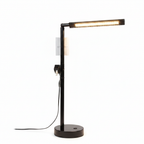 Room and Retreat 16-inch black LED desk lamp full profile on white studio background showing round base jointed arm and LED bar head