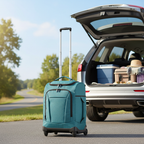 Teal blue rolling duffel with telescopic handle extended next to car trunk on sunny day — Protégé road trip travel bag — More4less Outlet