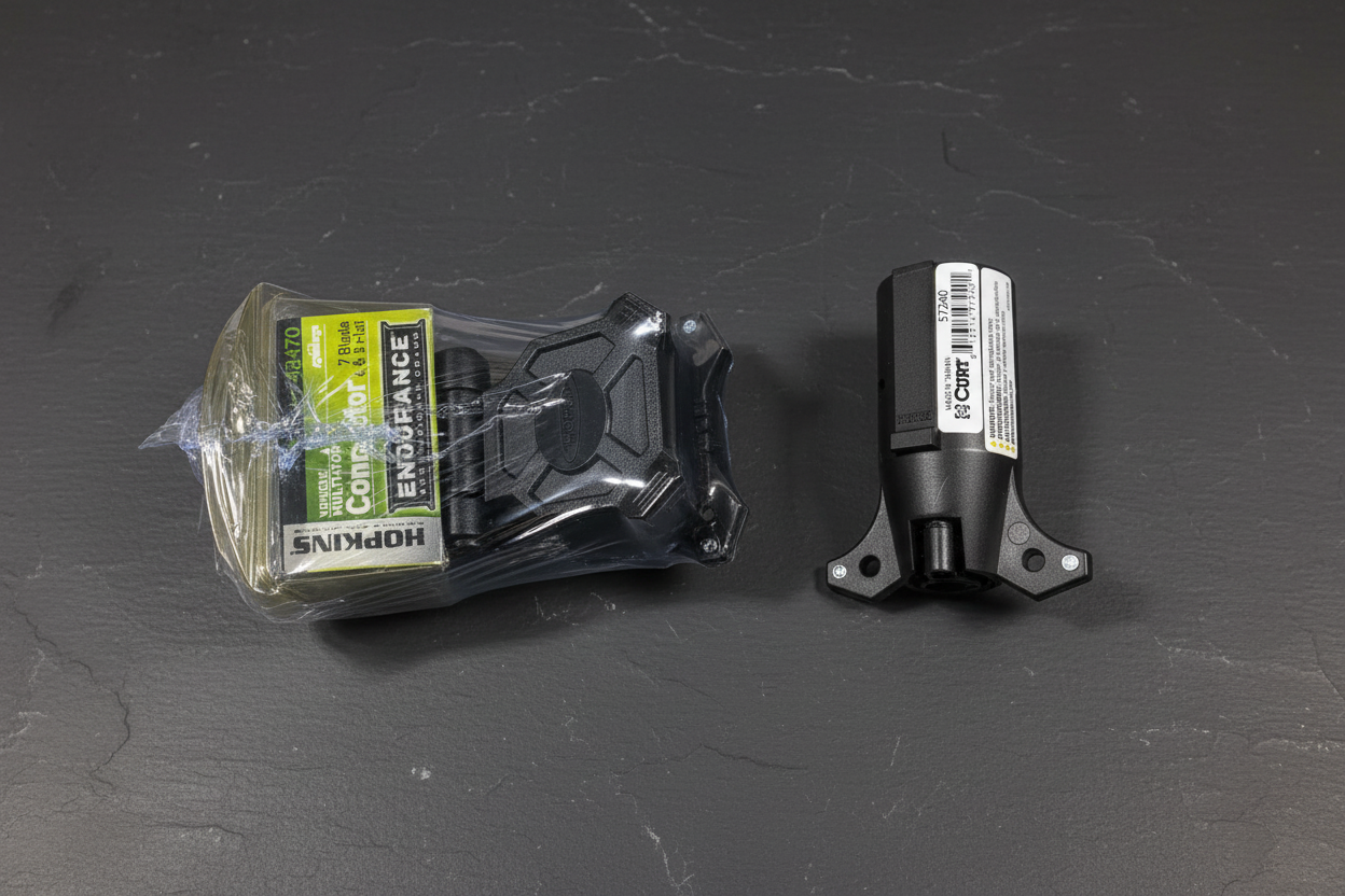 Hopkins CURT 7-way towing connection kit flatlay on dark slate with Hopkins retail pack and CURT connector displayed - More4less Outlet