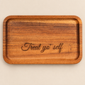 Treat Yo' Self engraved acacia wood tray on a neutral studio background