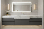 Luxury contemporary bathroom vanity with brushed gold lever hardware on white marble sink