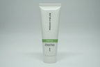Studio lighting detail shot of Rodan + Fields SOOTHE travel cleanser tube with green accent band