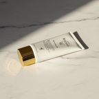 JAFRA Royal Revitalize SPF 50 Solar Protection Fluid on marble surface with morning light – More4less Outlet