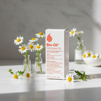 Bio-Oil Skincare Oil box on white marble vanity with soft morning light and delicate chamomile flowers – More4less Outlet