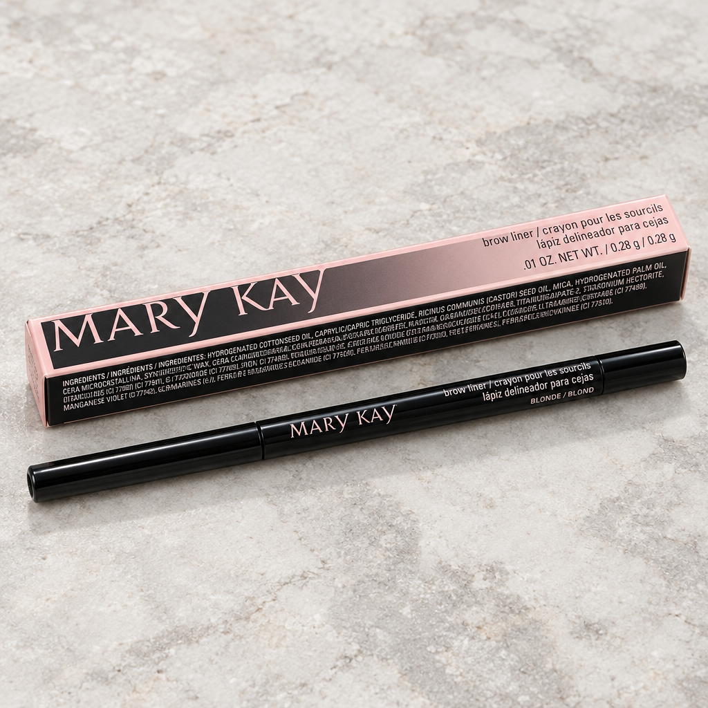 Mary Kay Brow Liner Blonde pencil and retail box on a pale stone surface