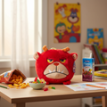Jay at Play Hangry Petz Rogue Red Monster sitting on kids desk next to snacks looking grumpy and hungry - More4less Outlet