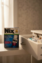 Nix Lice Killing Creme Rinse 2oz next to open household wellness kit medical organizer under natural lighting — More4less Outlet