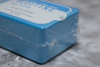 Macro detail of sealed wrap on Rodan + Fields 30-count cosmetic cleansing cloths package