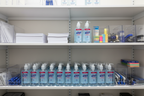 Purell Advanced bulk sanitizer restocking office supply closet shelf organization — More4less Outlet