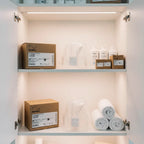 ResMed HumidAir water tub in organized white closet shelf demonstrating health-supplies maintenance storage
