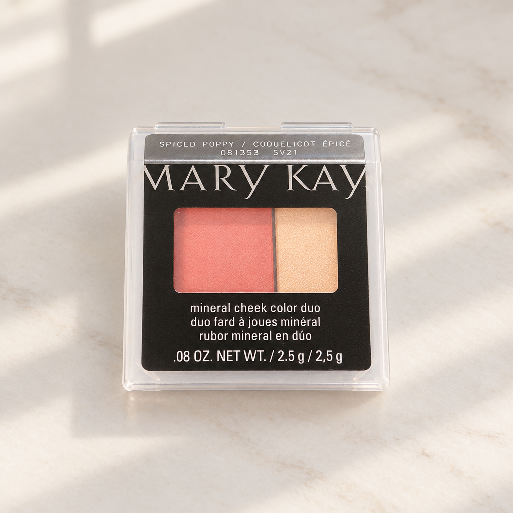 Mary Kay Mineral Cheek Color Duo Spiced Poppy compact on a softly lit vanity