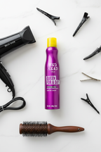 Bed Head TIGI Queen For A Day flat lay with hair dryer round brush and clips