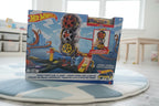 Hot Wheels City Super Twist Tire Shop playset box close-up on play mat in bright minimalist room