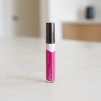 AI-generated lifestyle image of Mary Kay Glossy Lip Oil in Magenta Ray