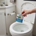 Thetford Campa Fresh toss-in packet being dropped into RV portable toilet - easy to use - More4less Outlet