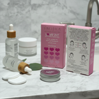 Vegan acne patch pink box beside reusable tin and skincare essentials on white marble bathroom counter – More4less Outlet