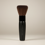 Mary Kay Mineral Foundation Brush upright against a neutral background