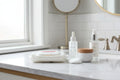 Clean bright vanity setup featuring Rodan + Fields makeup remover wipes alongside skincare basics on marble surface