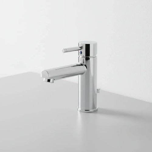 American Standard Serin chrome faucet minimalist studio table shot highlighting chrome finish lifestyle image