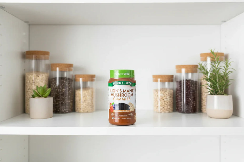 Nature's Truth Lion's Mane Gummies jar on bright minimalist wellness pantry shelf with plants