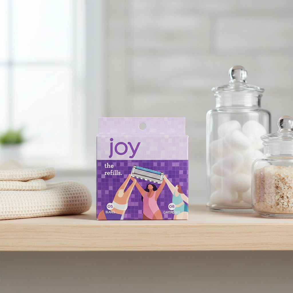 Joy 5-Blade Razor Refills 8ct on wood bathroom shelf with apothecary jars and waffle-weave hand towel