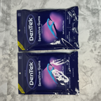 Two sealed DenTek Sensitive Gums Comfort Clean floss pick bags in a flat lay