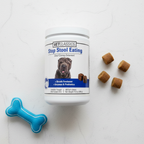 VetClassics Stop Stool Eating supplement tub flat lay with soft chew treats and dog toy on white surface