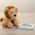 Russ Jazwares Lion Plush next to More4less Outlet Stuffed Friend Adoption Certificate gift flat lay - More4less Outlet