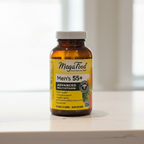 MegaFood Men's 55+ Advanced Multivitamin amber glass bottle in soft natural window light on white quartz countertop – More4less Outlet
