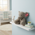 Russ Jazwares 21 inch Elephant Plush sitting on nursery shelf with soft pastel decor - More4less Outlet