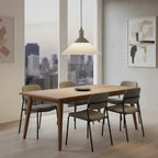 Globe Electric Baldwin matte grey pendant light hanging over modern dining table