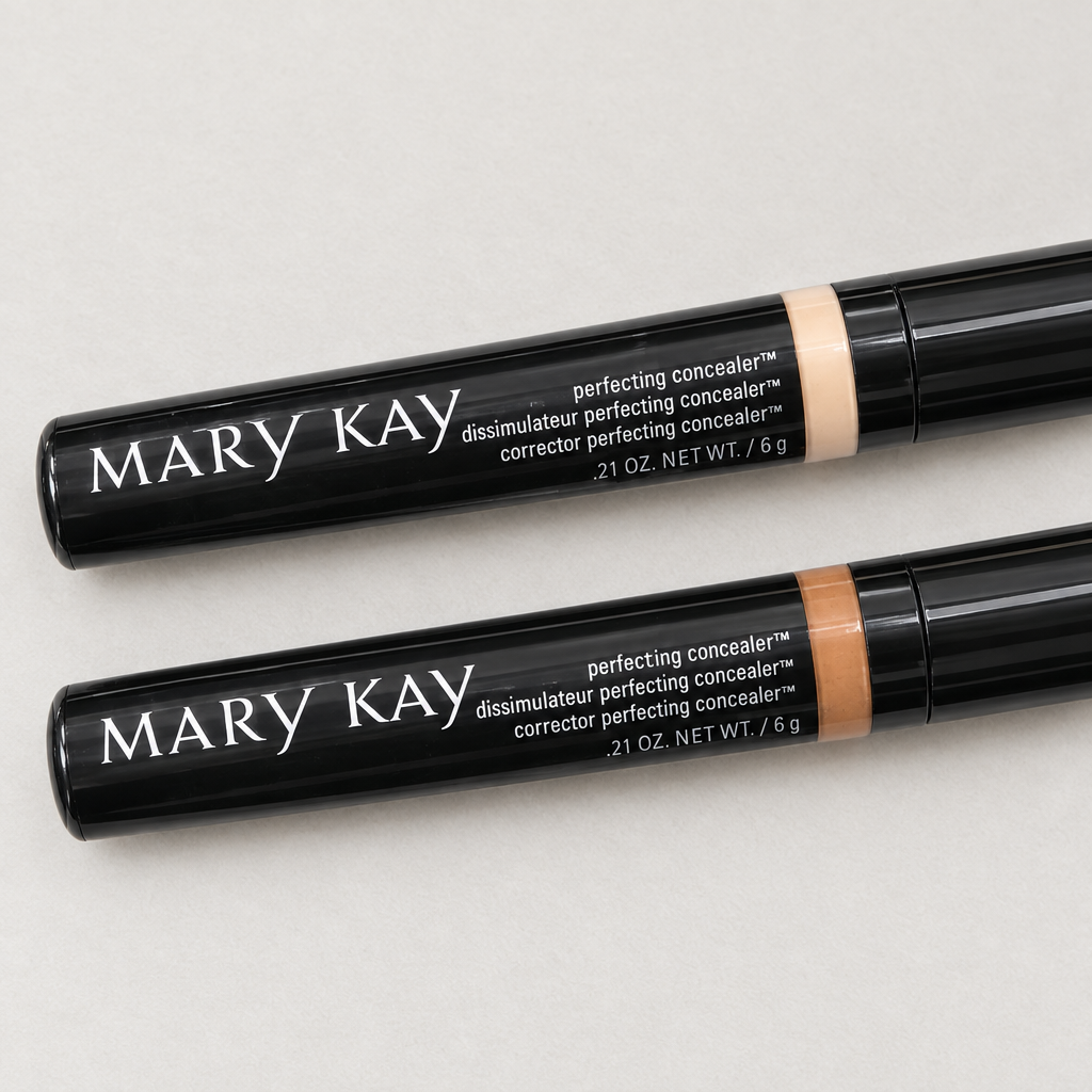 Close detail of Mary Kay Perfecting Concealer tubes in Deep Ivory and Deep Bronze