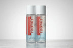 Studio lighting shot of Rodan + Fields ESSENTIALS Complete Eye Makeup Remover clear bottle with red and white label