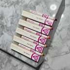Five Mary Kay At Play lip crayons violet brown coral pink plum fan display white marble surface premium beauty product flat lay - More4less Outlet