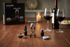 Houdini Wine Tool Kit 4-Piece Set all tools arranged on walnut wood with red wine and glasses - More4less Outlet